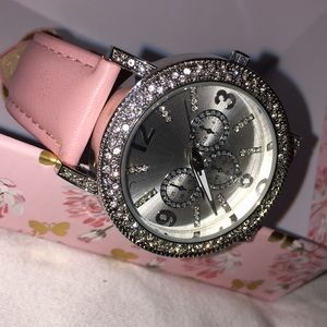 PINK Cubic zirconium wristwatch .